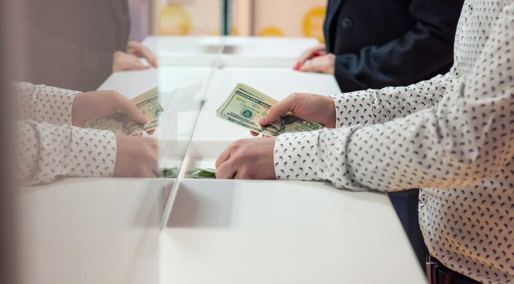 someone doing some BANKING with cash
